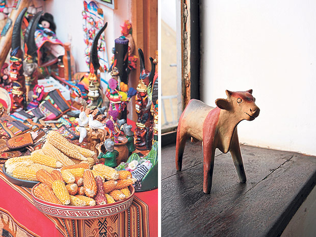 The market at Maras explodes in a profusion of colour (left). This miniature cow is a typical Peruvian handicraft (right).