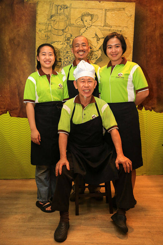Three generations of the Ang family (from left to right): Tham Hooi Chin, Tham Kum Fook, Ang Kar Bee with Ang Kok Peoh or Angcle Peoh
