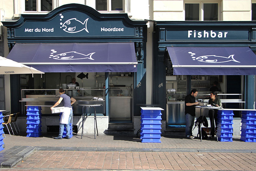 It’s standing room only at the De Noordzee (La Mer du Nord) fish bar.
