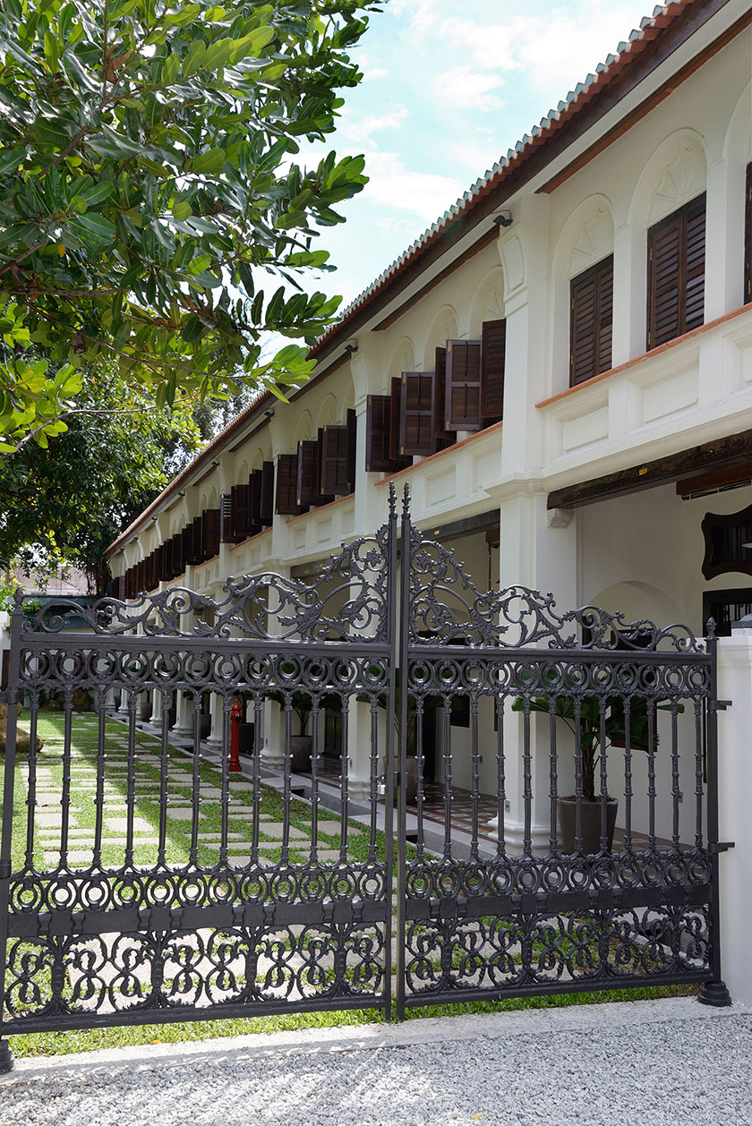 A hidden garden behind the ornate wrought iron gate of Muntri Grove.