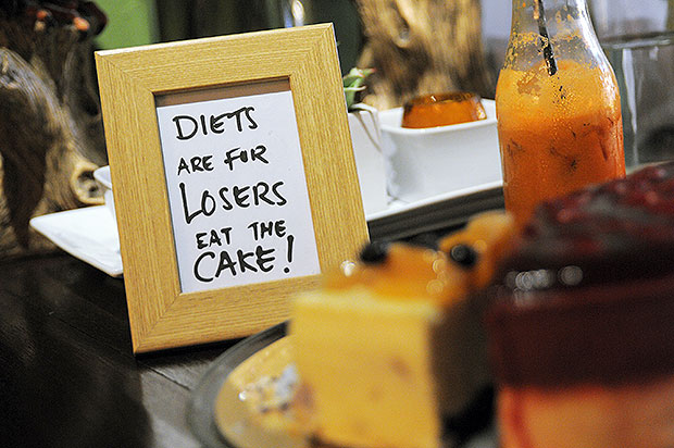 Diets are for losers, eat the cake...a reminder to diners to enjoy Moody Cow's delicious cheesecakes.