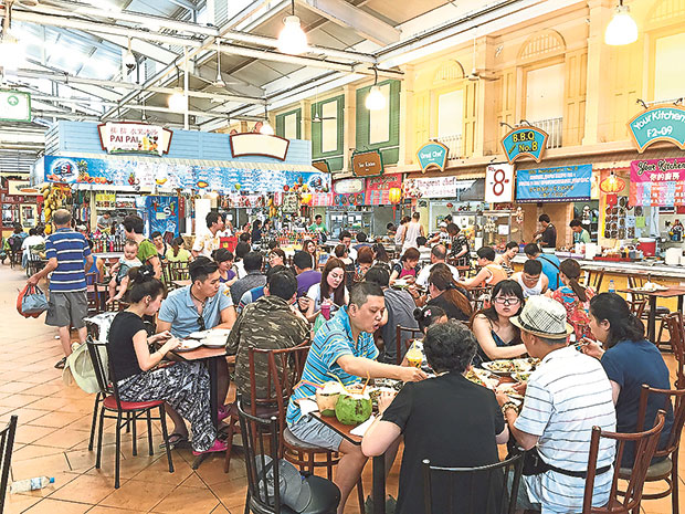 The food court at the Banzaan Market with rows of stalls offering to cook your fresh seafood in any way you like.