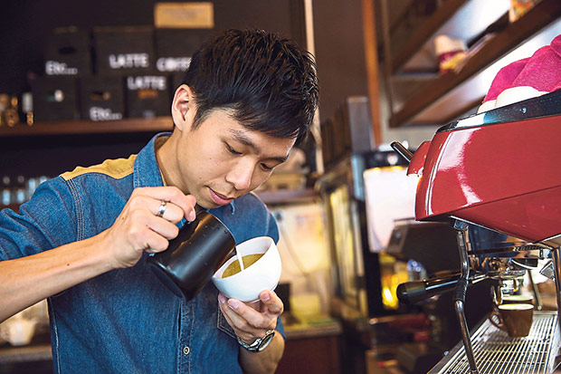 Pouring milk and foaming it into latte art takes patience, a steady hand and lots of practice