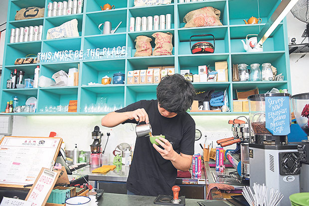 Kenneth making a cappuccino.