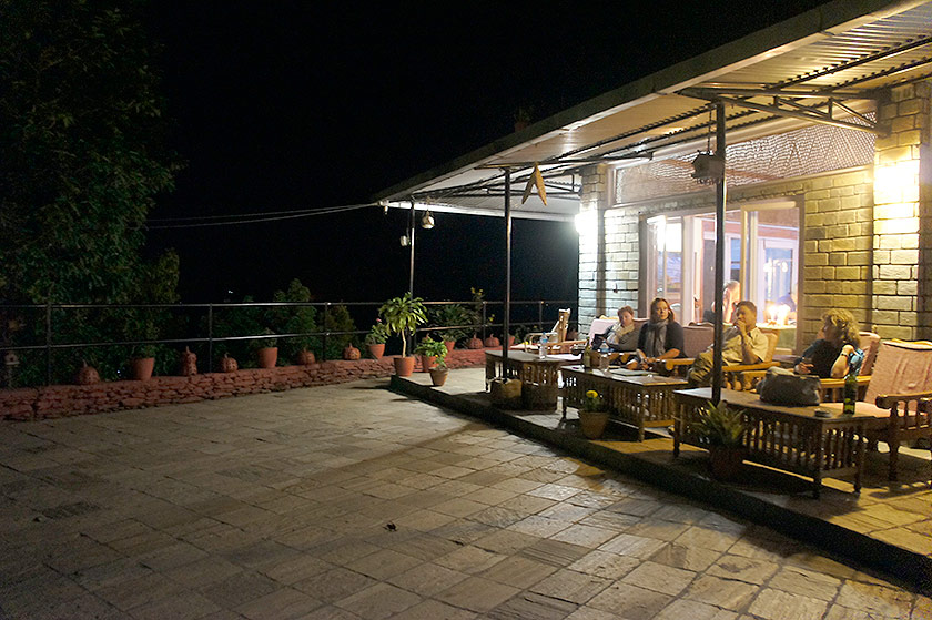 Guests resting at the restaurant terrace after dinner.