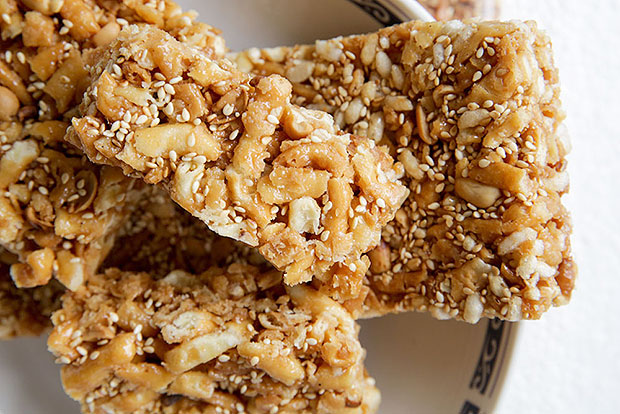 Look for this version of sat kei ma that mixes rice puffs, sesame seeds and nuts together for a satisfying crunch at the fruits stall along the main street of Titi.