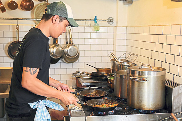 Sous chef Kenny Lor is part of the tight knit Kitchen Mafia family.