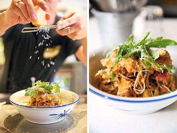 Grating cheese over homemade pasta (left). You get a selection of homemade pasta with all kinds of sauces including Asian inspired flavours like salted egg yolk with soft shell crab (right).