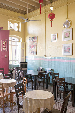 Passion Heart in Muntri Street is simply furnished without the modern trappings of most other cafes.