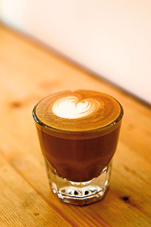 Pair your pastries with coffee served in a thick Gibraltar glass.