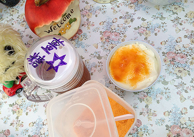 Homemade tofu pudding with orange-coloured ginger sugar