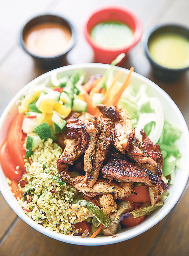 Their crowd favourite grilled chicken salad bowl with couscous