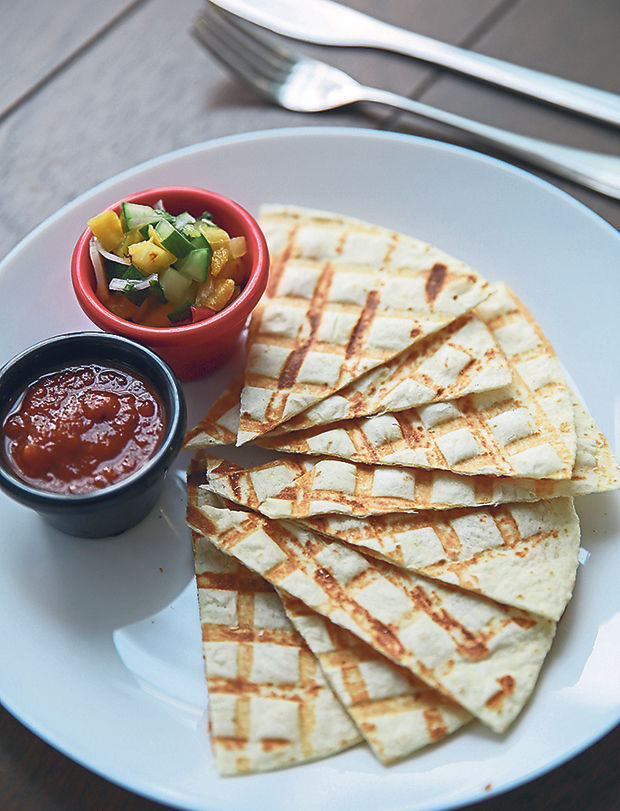 Toasted tortilla accompanied with your choice of sauces