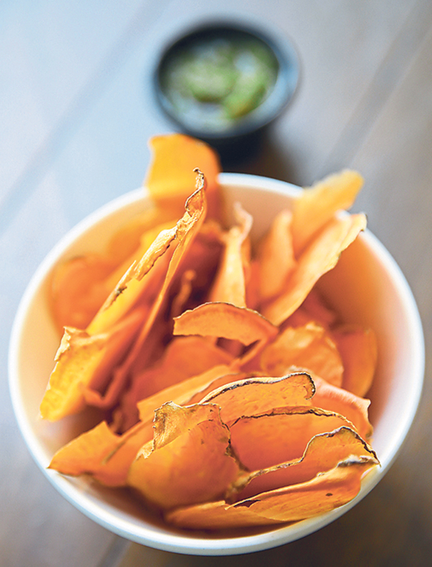 We guarantee you won’t stop eating these baked sweet potato chips