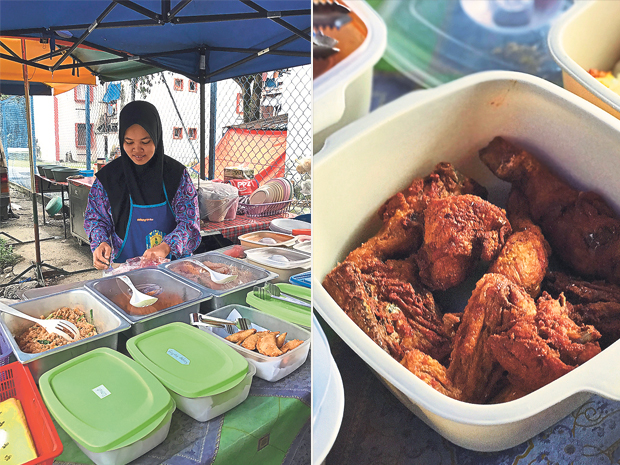 The various lauk (dishes) and kuih-muih available at the nasi lemak stall (left). Crunchy fried chicken (right)