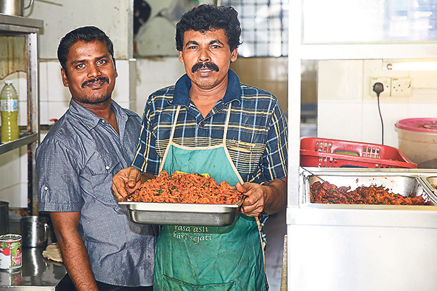 From 11am onwards, freshly cooked food is brought out in batches by the workers