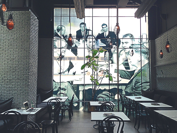 A mural on the floor-to-ceiling windows sets the tone at all Six to Twelve