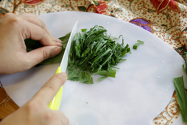 It’s time to finely cut the herbs for the Rainbow Healing Rice