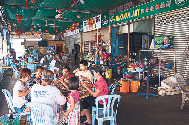 The no-frills open air seafood restaurant upstairs is open from 10am daily