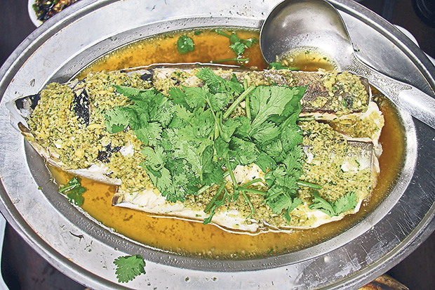 Cantonese-style steamed fish head with ginger