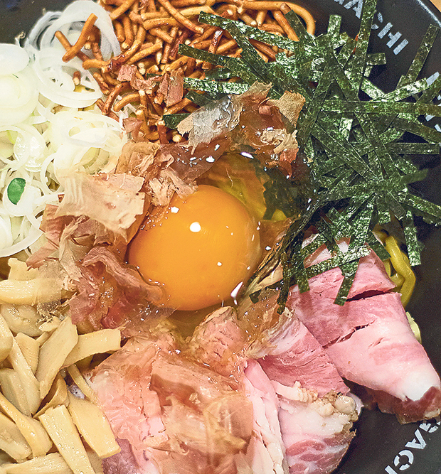 GACHI Aburasoba’s ka madamayu-soba has a raw egg, nori strips and bits of crunchy fried ramen noodles