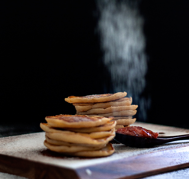 Dust each stack of pancakes with with caster sugar