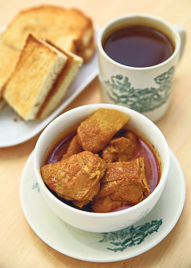 You can order a bowl of chicken curry with your nasi lemak or bread