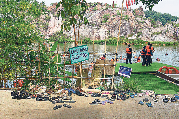 Shoes off, life jackets on before entering the lake