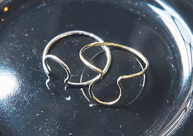 The Omega ring comes in a choice of 14-karat gold or sterling silver