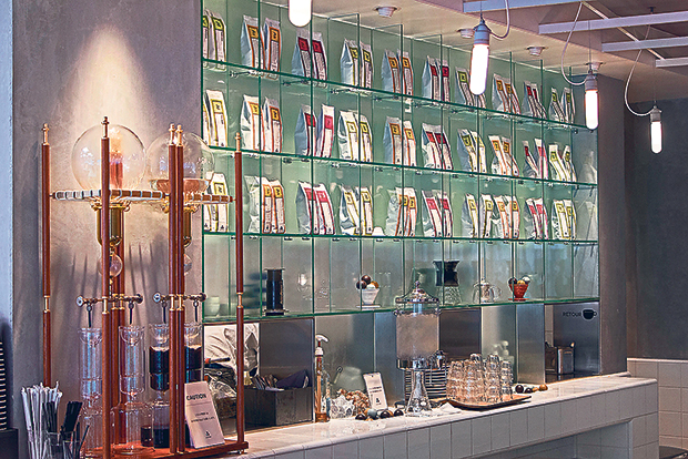 Coffee equipment and bags of beans on display at Coutume Café Aoyama