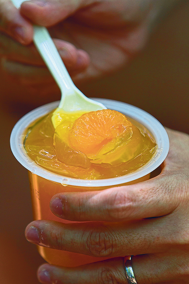 Complete your picnic lunch with chilled cup of orange jelly from the konbini (Japanese convenience store)
