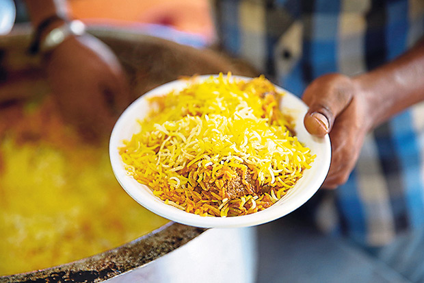 Simply beautiful saffron infused biryani straight from the pot at Hyderabad Biryani House.