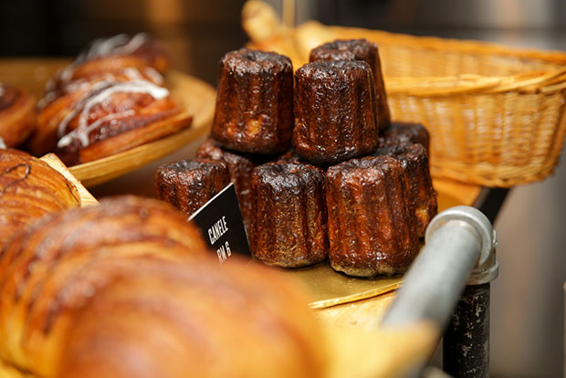 Pick up all kinds of baked goodies like these French caneles.