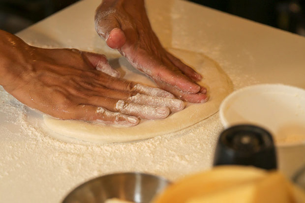 The dough for the pizza is hand stretched for a light and airy crust.