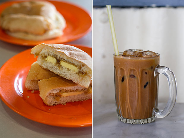 Kluang Rail Coffee’s roti bakar is available as crusty buns filled with kaya and butter (left). Try a cool mug of cham ais (iced coffee-and-tea) for a change (right).
