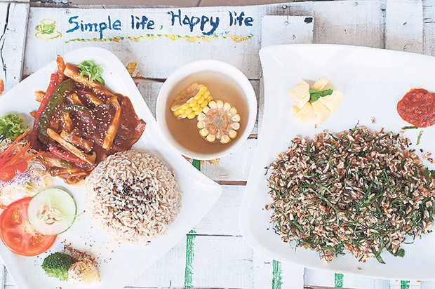The Leaf’s rice set with eryngii mushrooms (left) and nasi ulam (right).