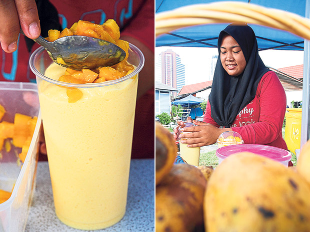 Adding the fresh ripe mangoes to the mangga susu at Gerai Tok Abah (left). During the day, Gerai Tok Abah is run by Nor Hayana binti Mukari (right).
