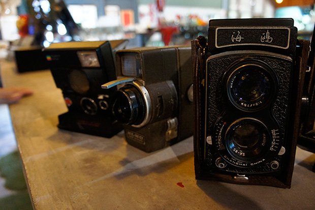 Vintage cameras are part of the decor items scattered around the cafe-cum-gallery.