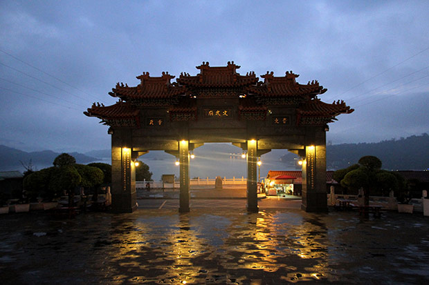 The Gateway and Ceremonial Arch, which overlooks Sun Moon Lake, lit up at night.
