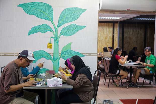 Colourful murals decorate the walls in the restaurant.