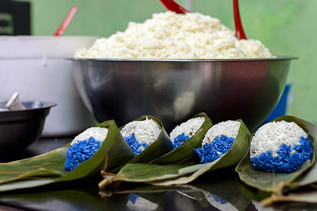 Rows of Nyonya chang waiting for the final wrap to close the packets.