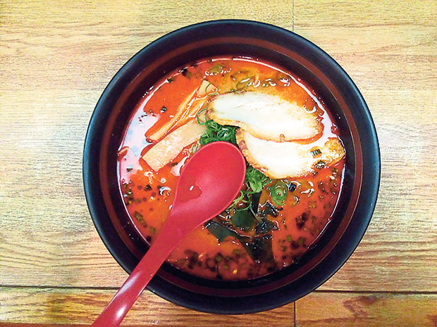 Keep the heat of the hot baths going at Spa World with some spicy ramen.