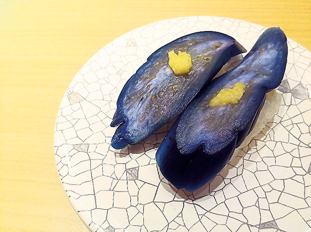 Namba Walk has no shortage of good eats such as this unique pickled eggplant sushi.
