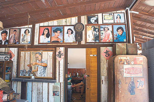 Framed photographs of popular Hong Kong actors grace this retro-fitted cafe.