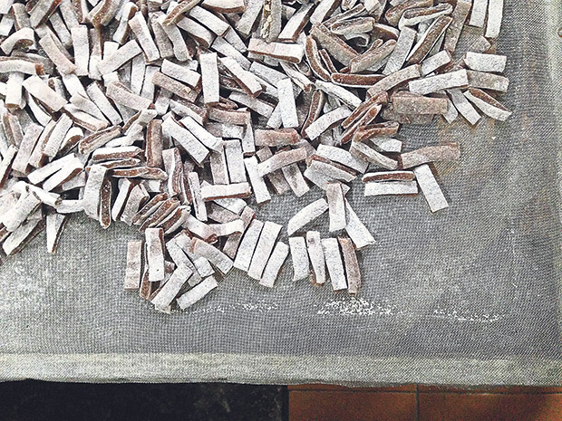 Mua lao sticks, before they are baked with firewood to puffed perfection.