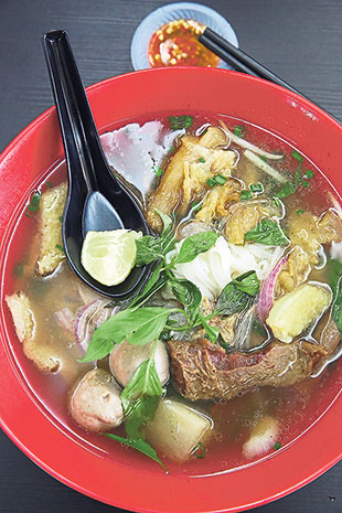 Slurp the delicious Phở bò dặc biệt filled with beef brisket, tendon and tripe from Ara Vietnamese Noodles.