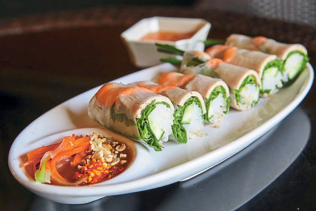 The refreshing Gỏi chuồn or fresh spring rolls filled with vermicelli, prawns, vegetables and pork slices is delicious with the peanut sauce.