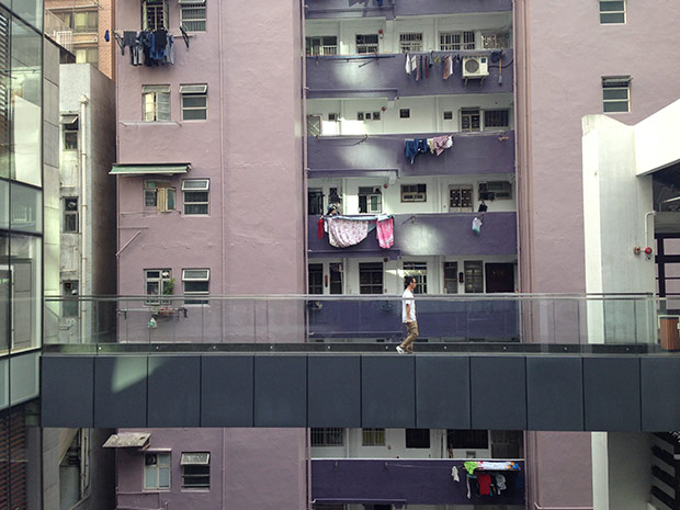 Comix Home Base’s immediate neighbour is an apartment block.