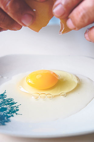 A freshly laid egg has an intense yellow yolk, clear whites and no smell.
