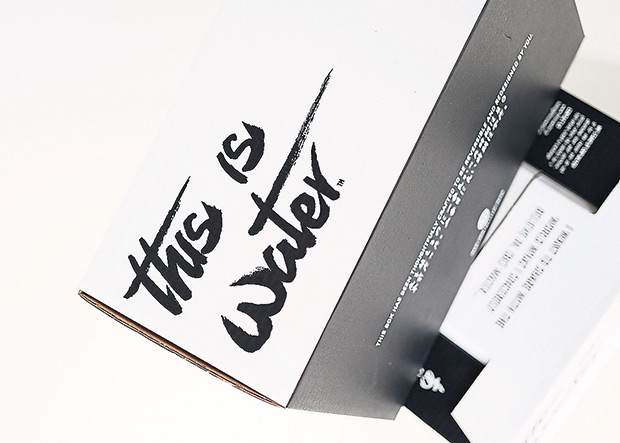 Jayce Izumi created This Is Water’s logo by handwriting it using a traditional brush.